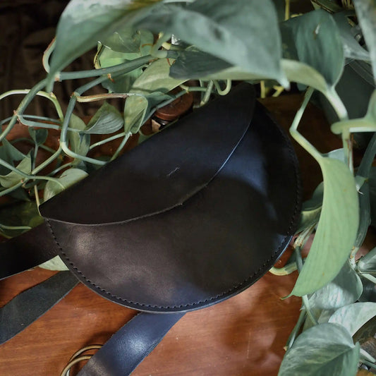 Sleek black leather belt bag designed for everyday wear