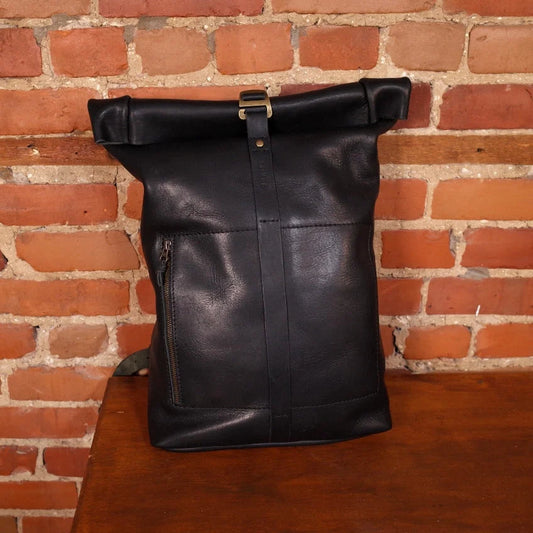 Minimalist black leather roll-top knapsack for everyday carry