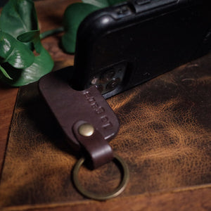 Dark brown phone support keychain