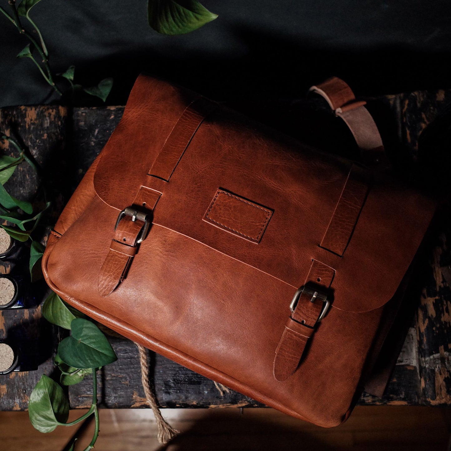 Personalized saddle tan leather satchel with custom engraving

