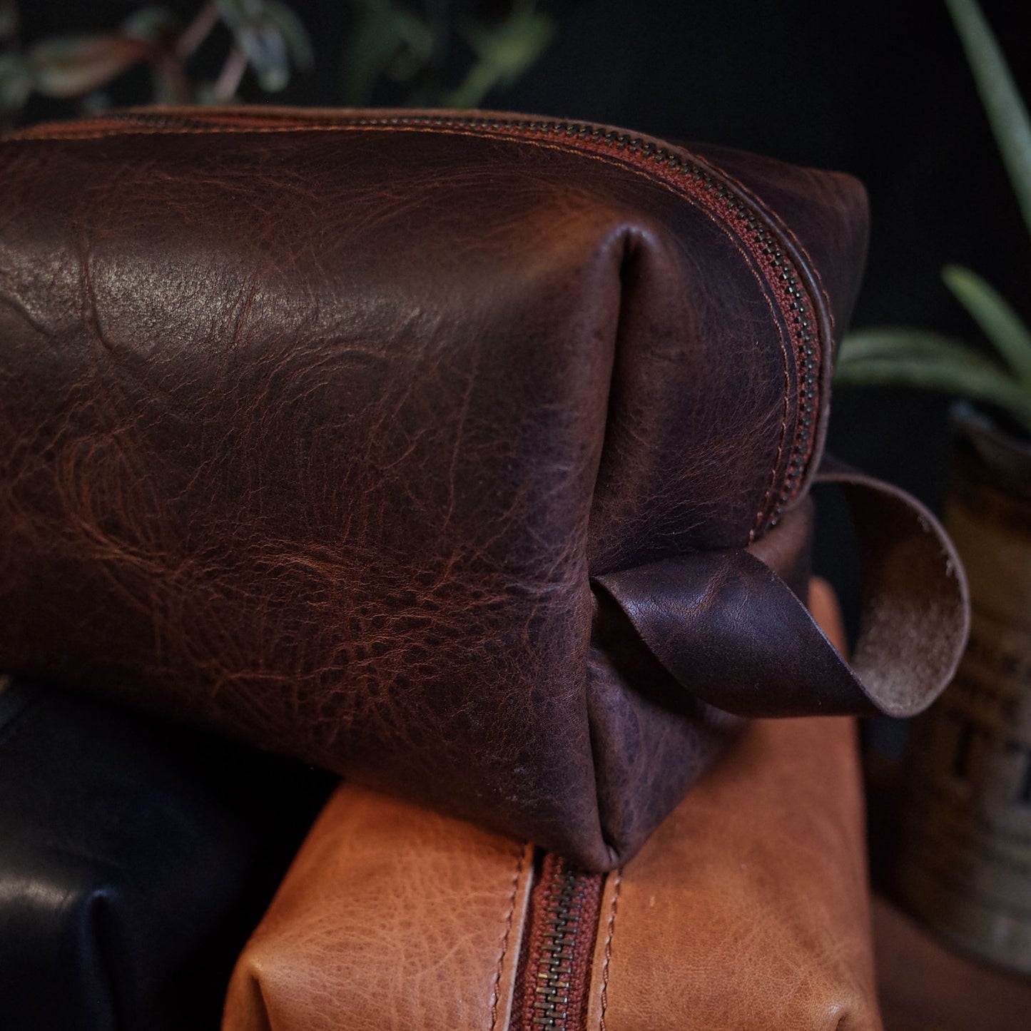 Handcrafted chocolate leather toiletry bag with custom engraving
