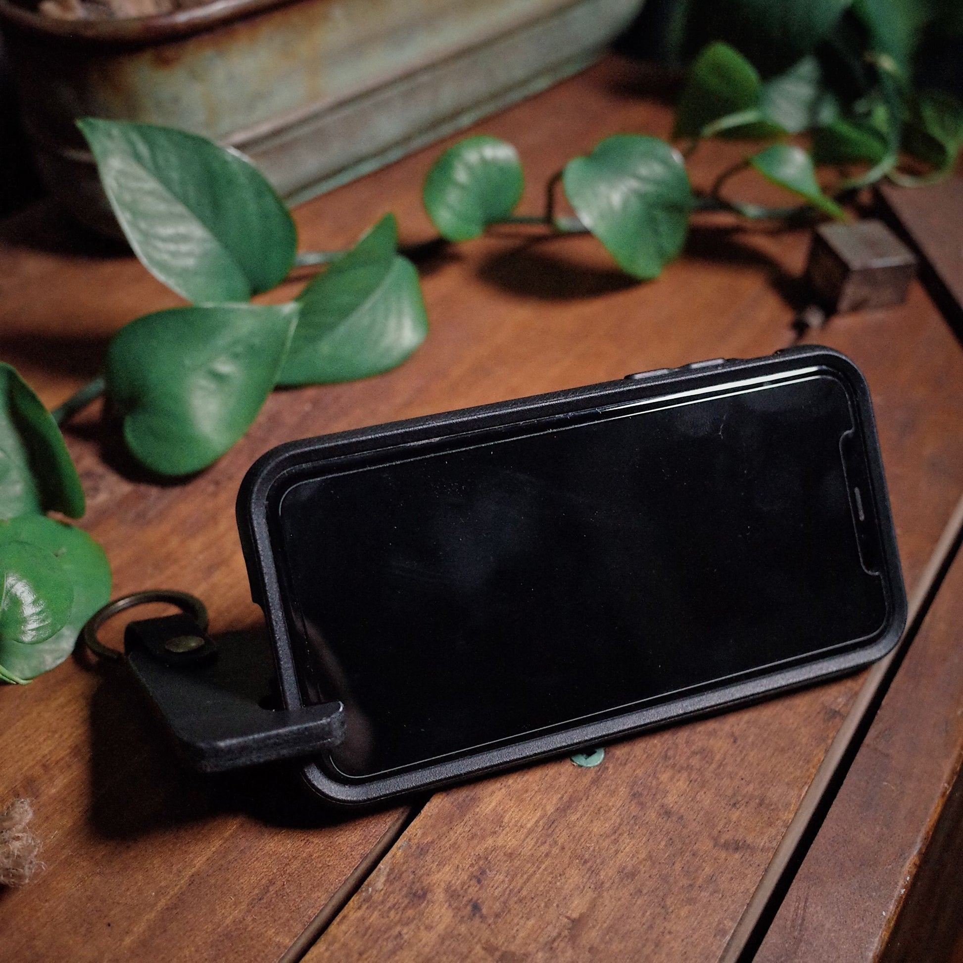 Black leather keychain phone holder with heavy-duty key clasp

