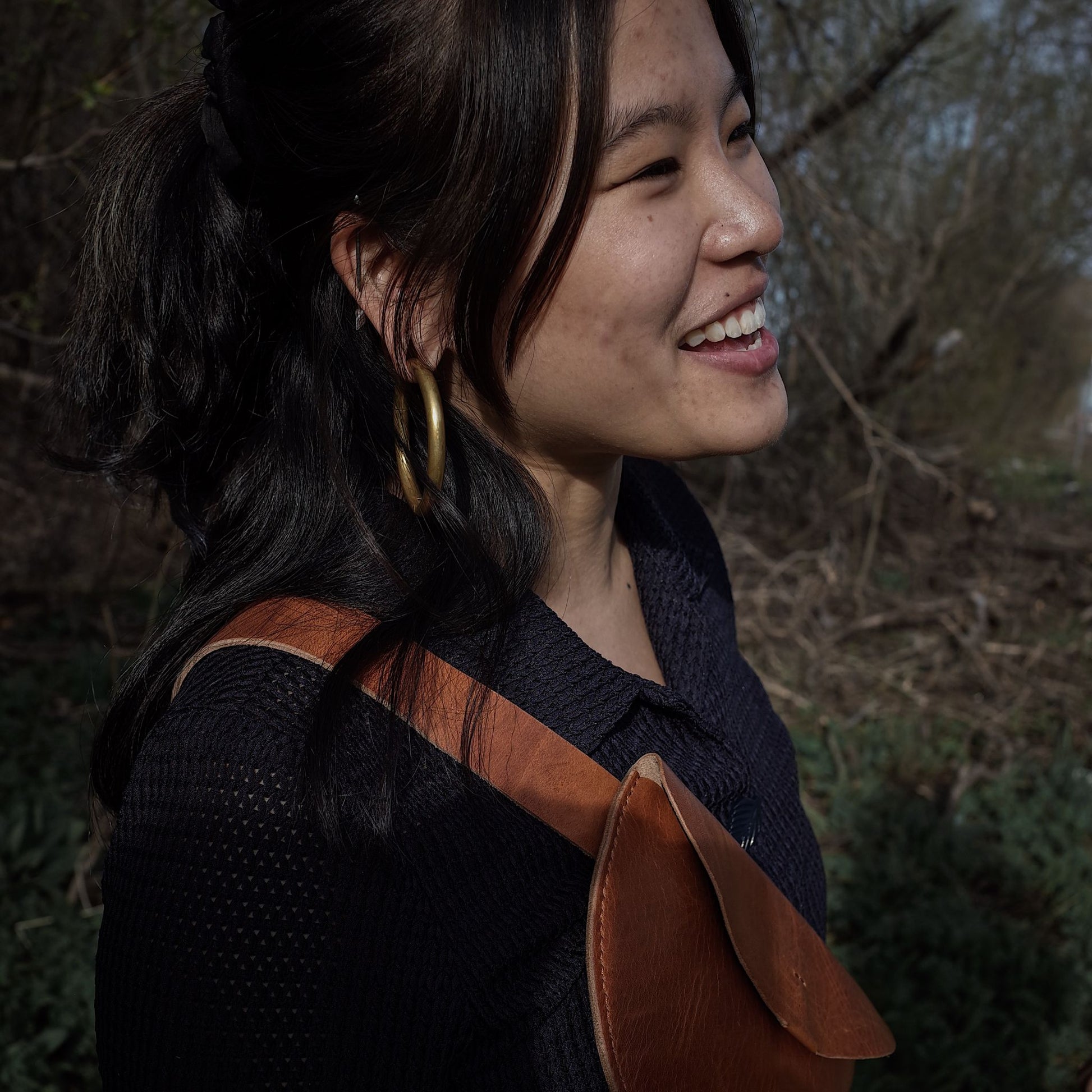 Artisanal cognac leather belt bag perfect for night-out essentials
