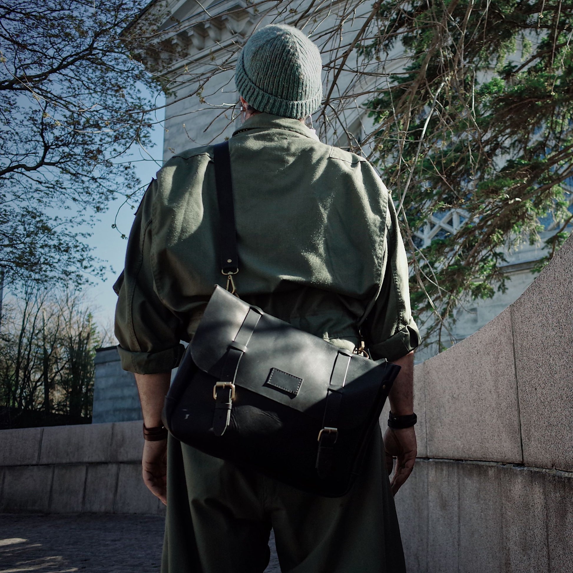 Elegant black leather carryall for work or business trips
