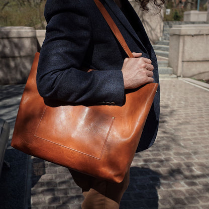Hand-stitched caramel leather carryall for daily use
