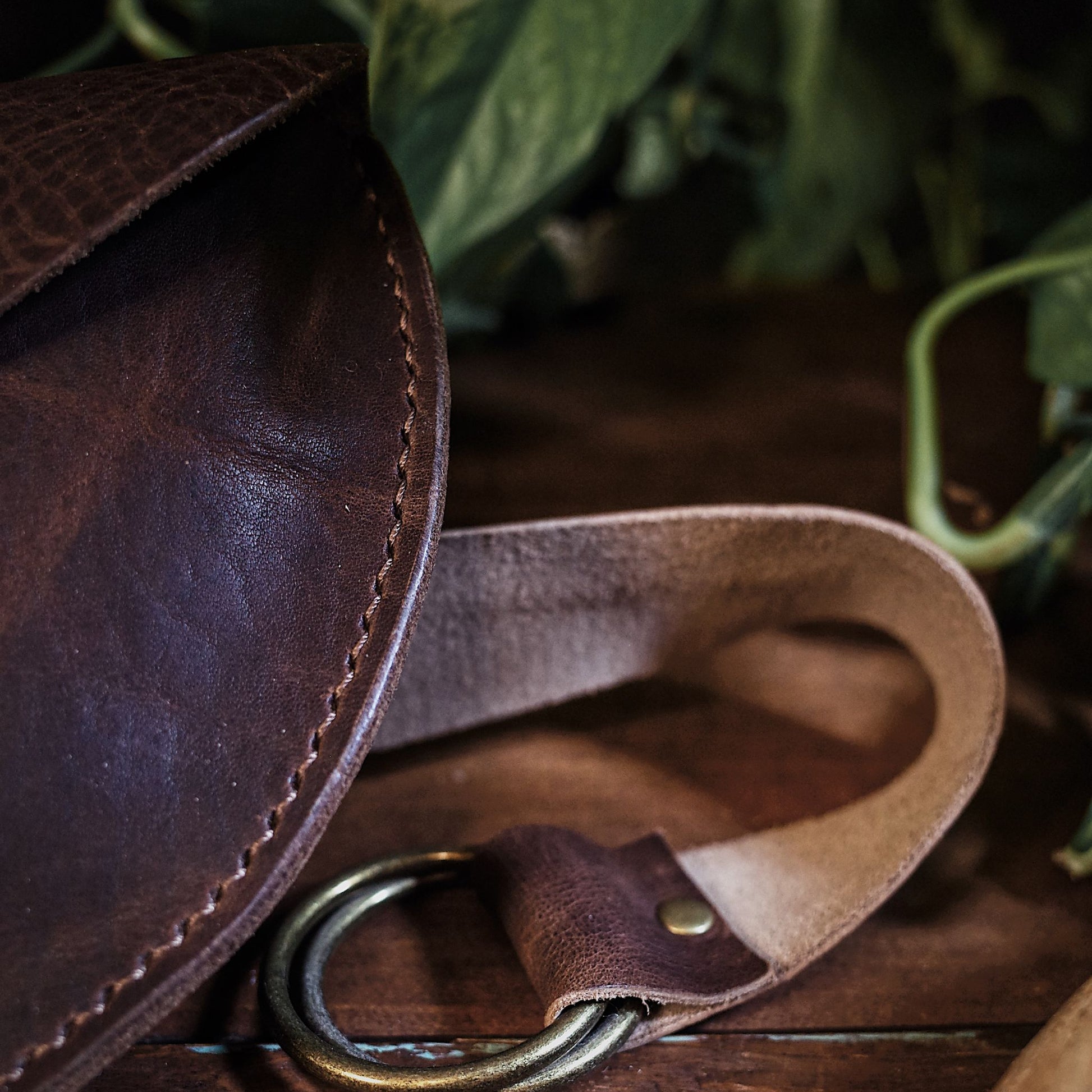 Durable chestnut leather belt bag for carrying small essentials
