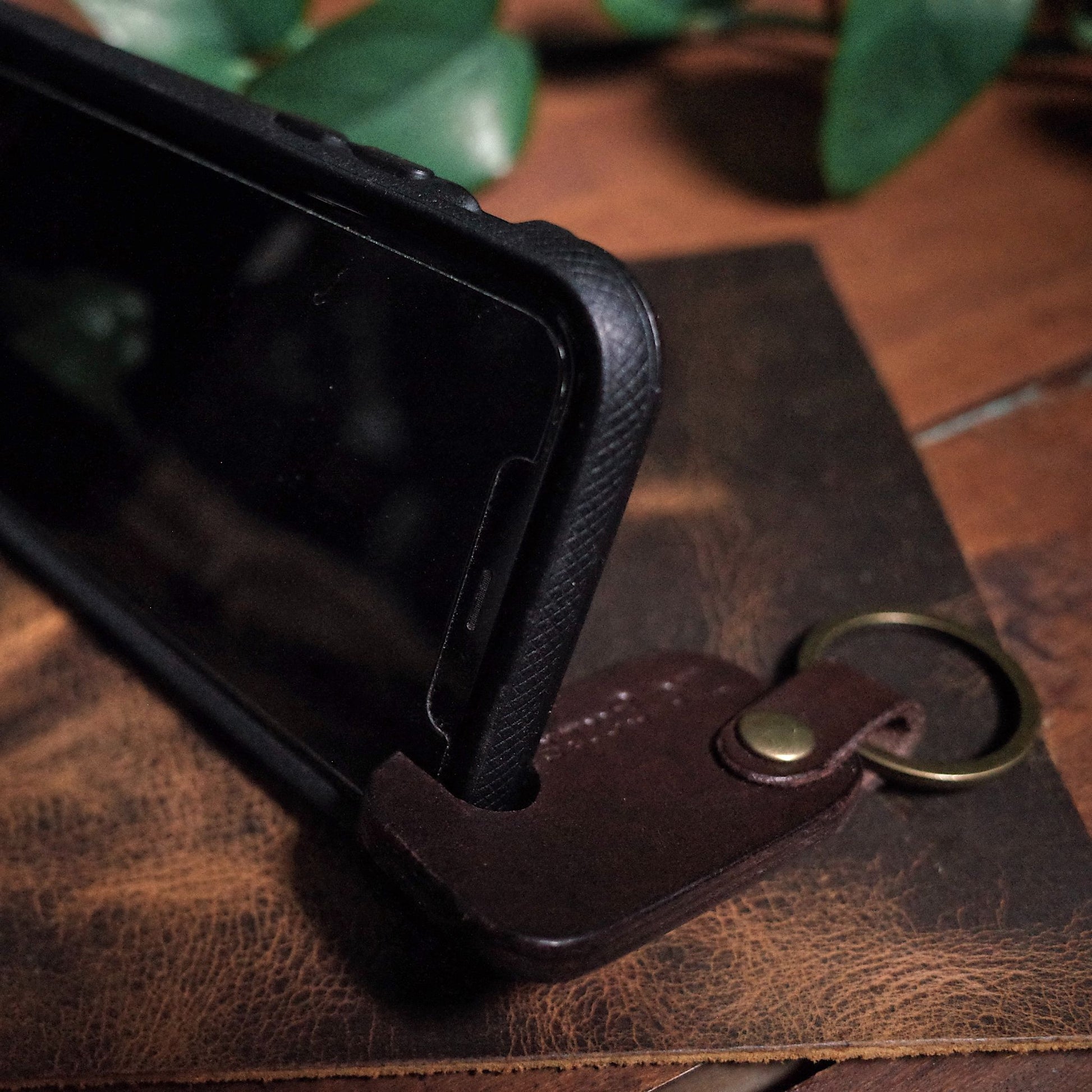 Compact mocha leather key fob phone holder with premium stitching

