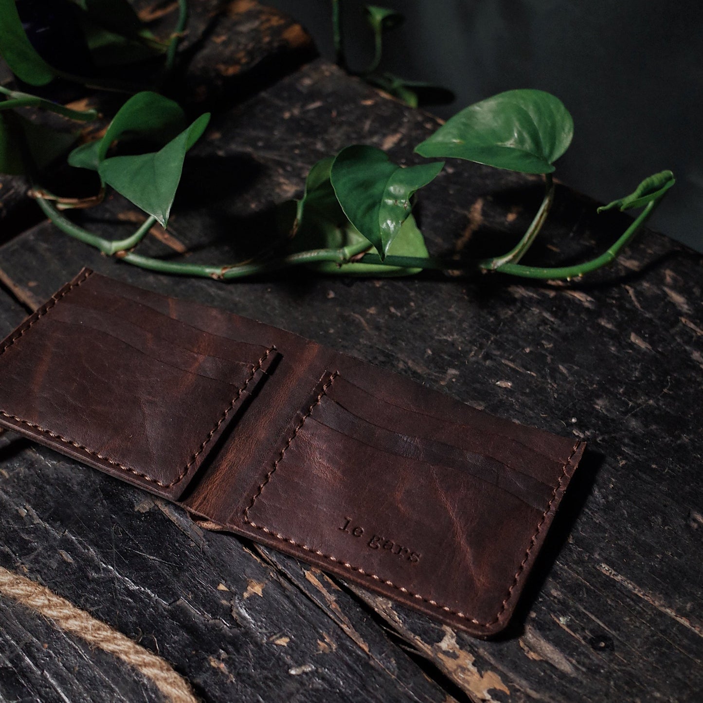 Stylish dark-brown leather wallet for modern professionals
