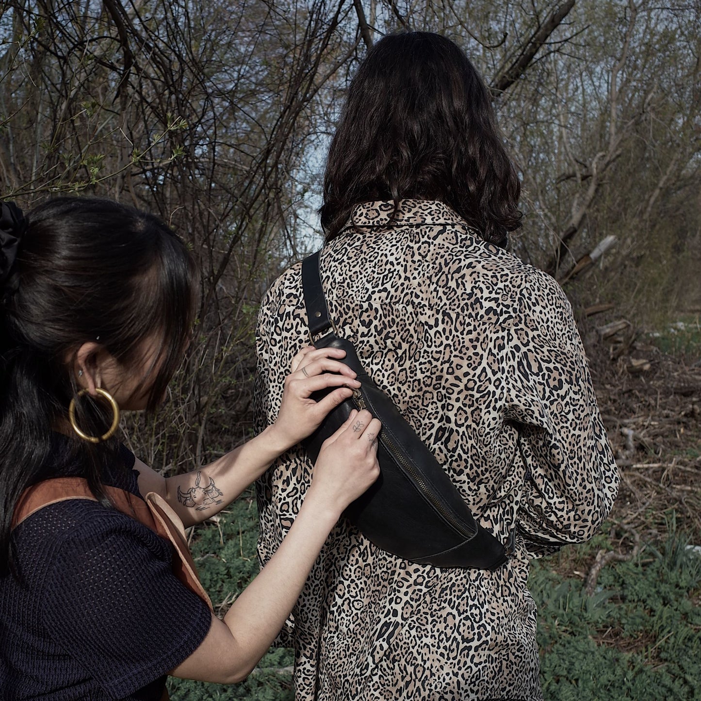 Handcrafted black leather fanny pack with oversized compartments
