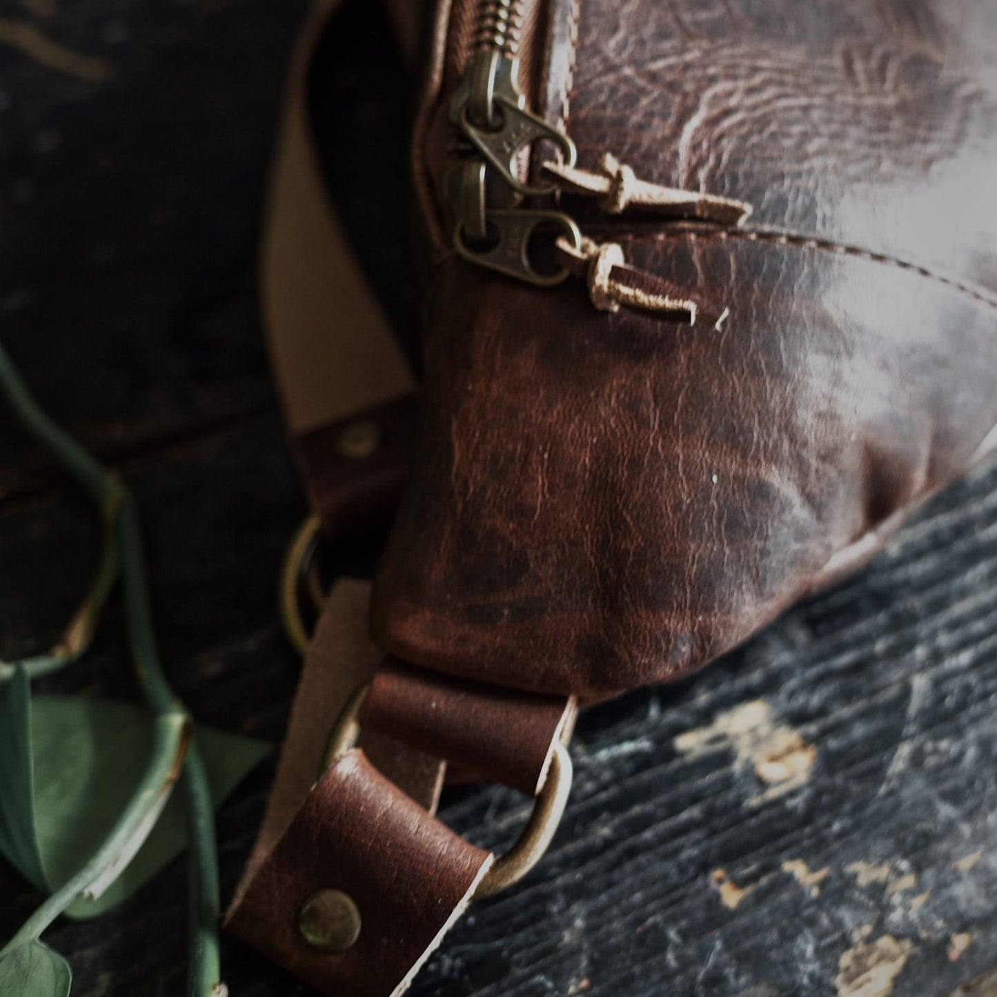 Large dark-brown leather belt bag designed for everyday carry
