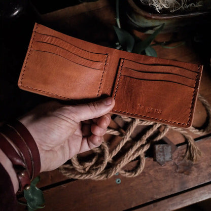 Minimalist caramel leather bifold wallet for men and women
