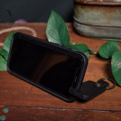 Minimalist black leather key fob phone holder for everyday carry
