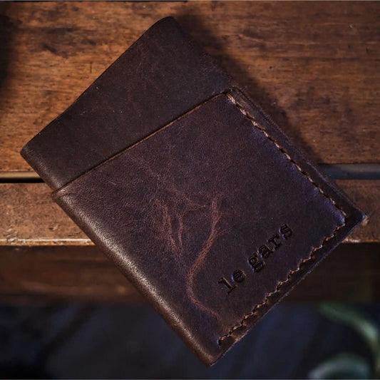 Minimalist full-grain chocolate leather cardholder for men and women
