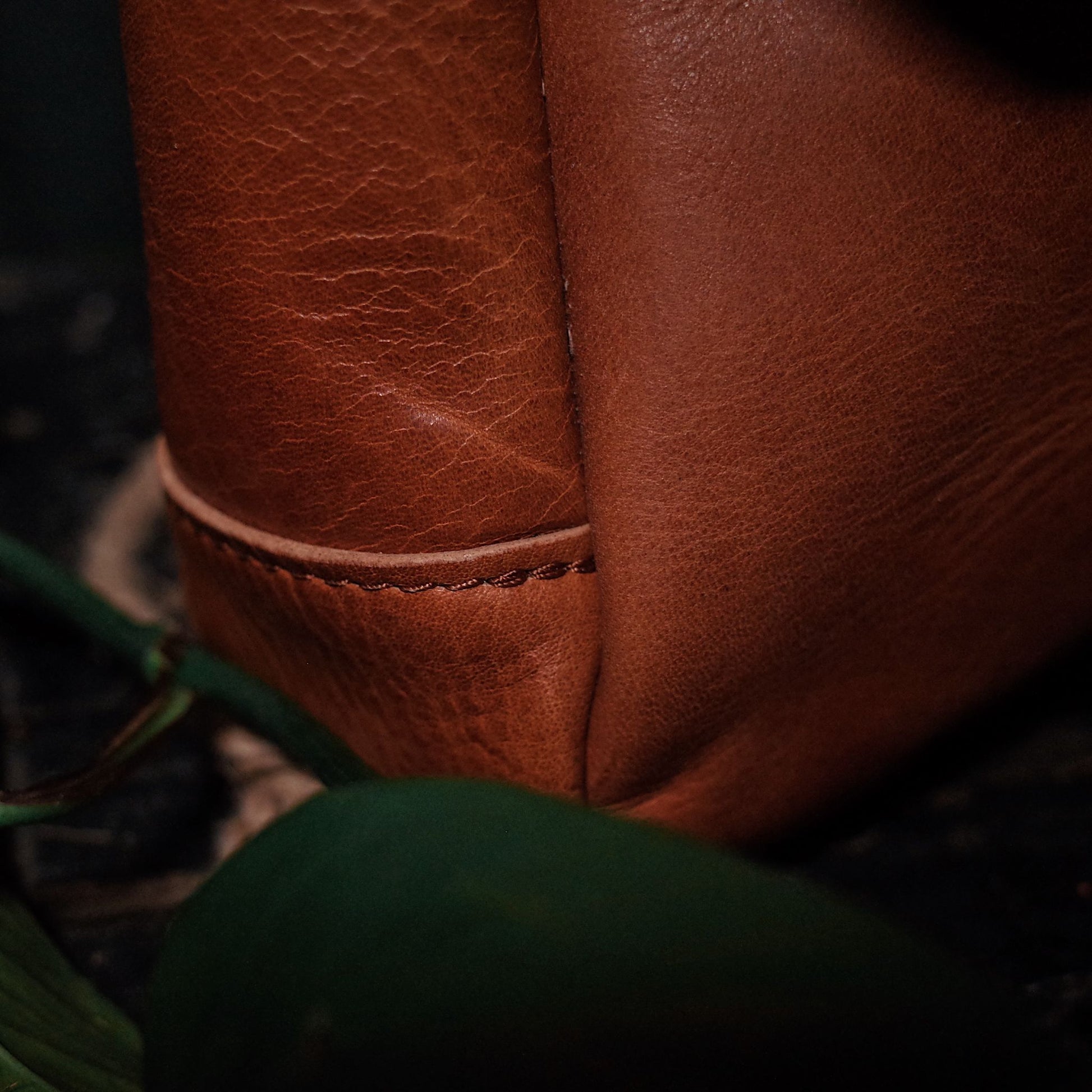 Classic caramel leather tote for carrying daily essentials
