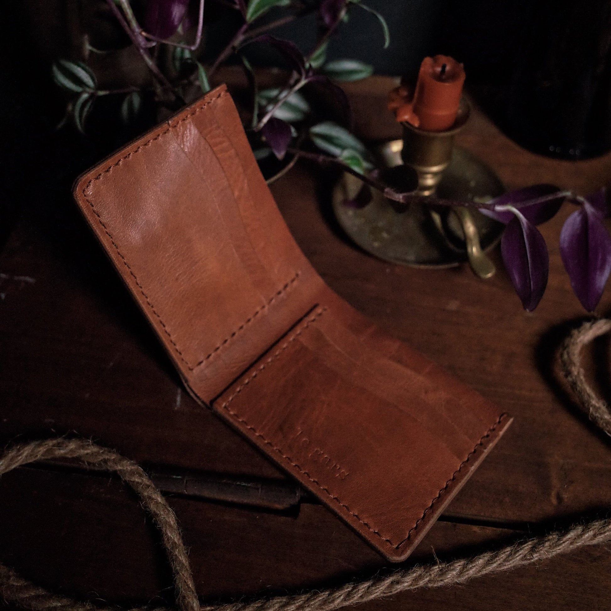 Sleek saddle tan leather bifold wallet for everyday use
