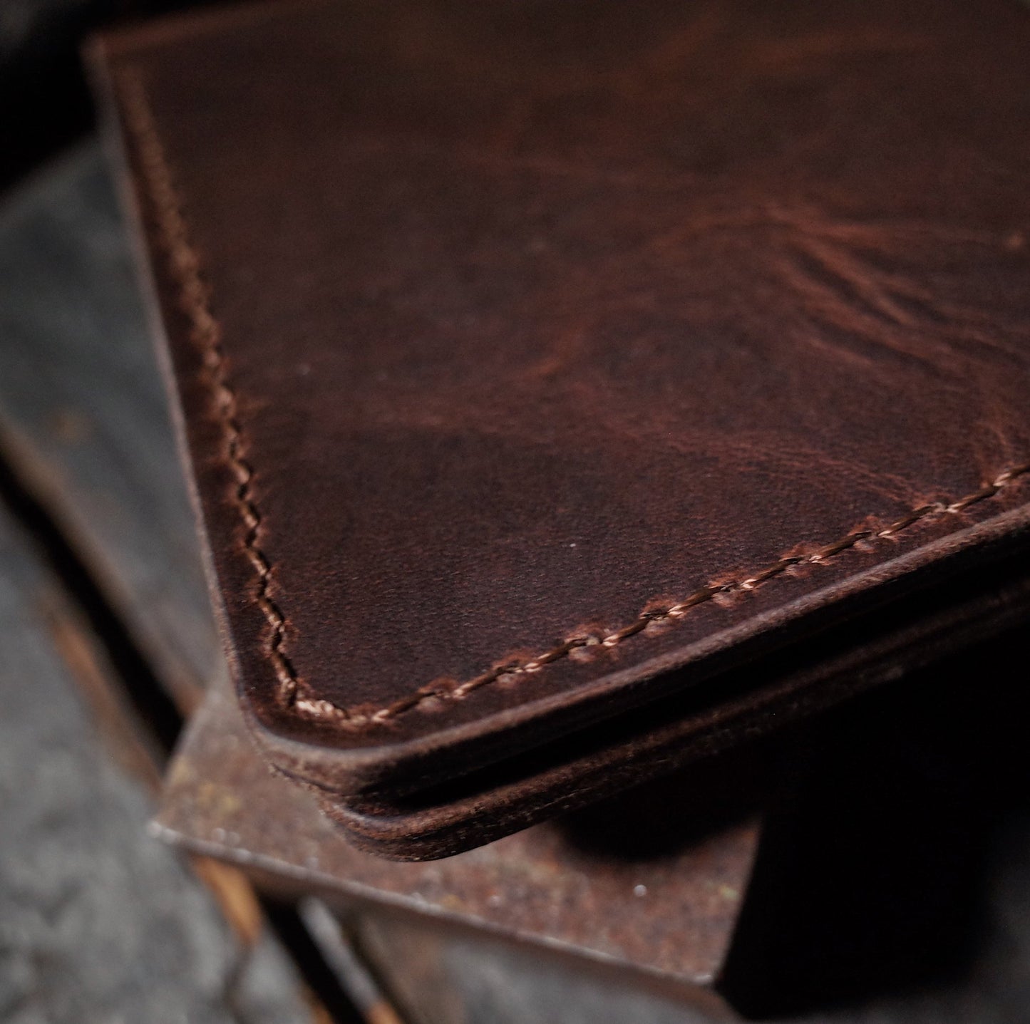 Sleek chestnut leather bifold wallet for everyday use
