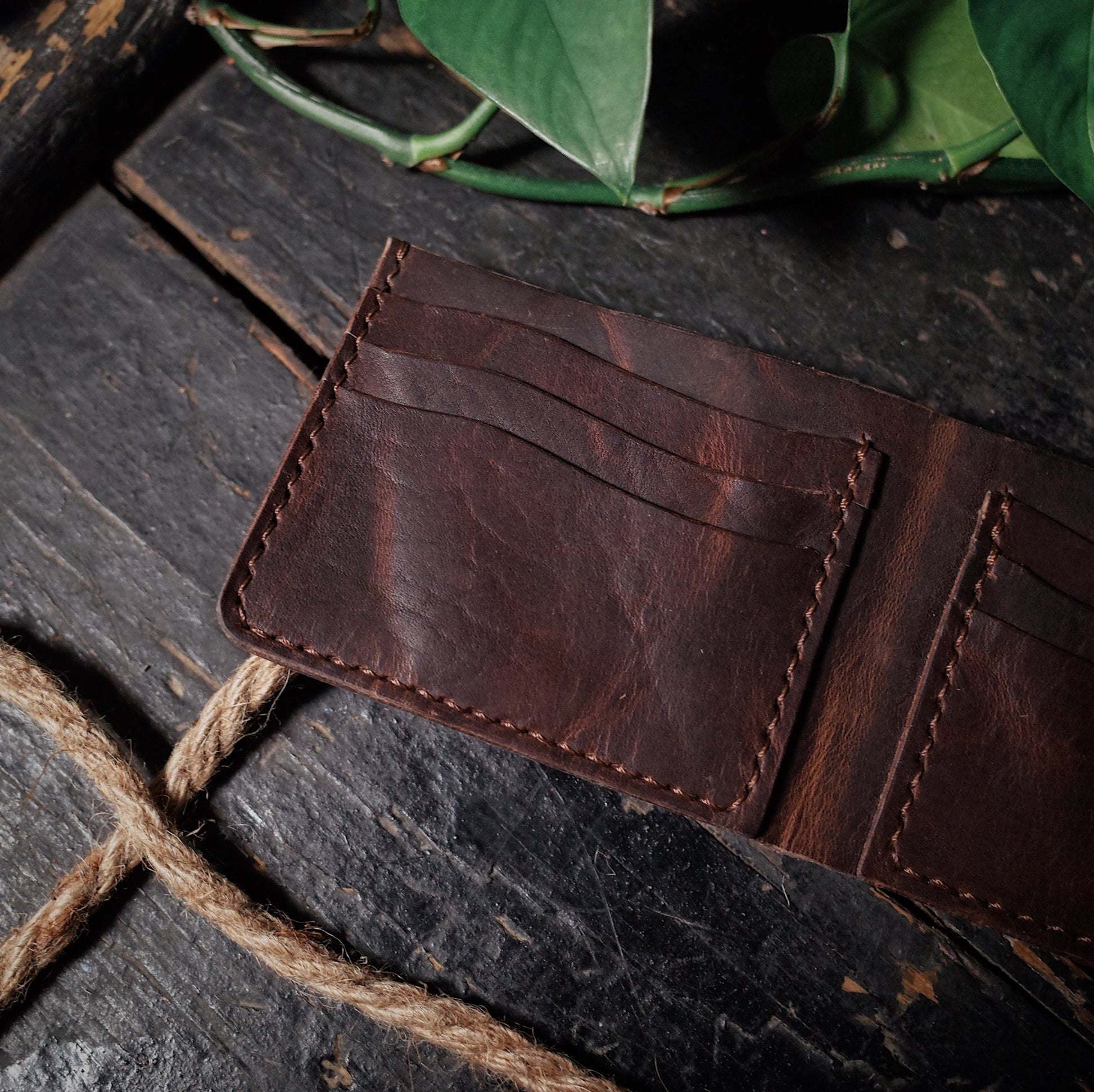 Premium mocha leather bifold wallet for a refined, classic look
