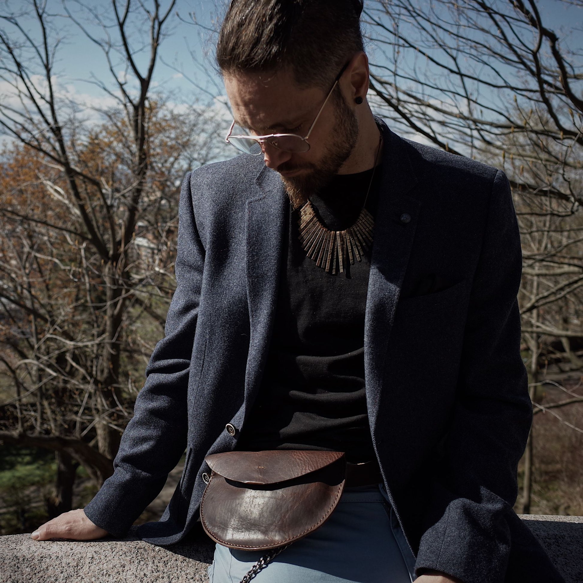 Compact coffee brown leather fanny pack with premium materials
