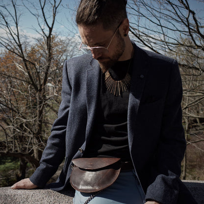 Compact coffee brown leather fanny pack with premium materials
