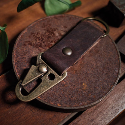 Stylish dark-brown leather key clasp with heavy-duty carabiner
