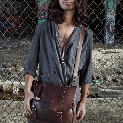 Hand-stitched dark-brown leather briefcase crafted by Montreal artisans
