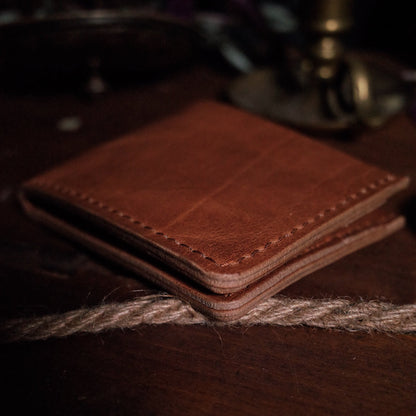 Sleek English tan leather bifold wallet for a professional look
