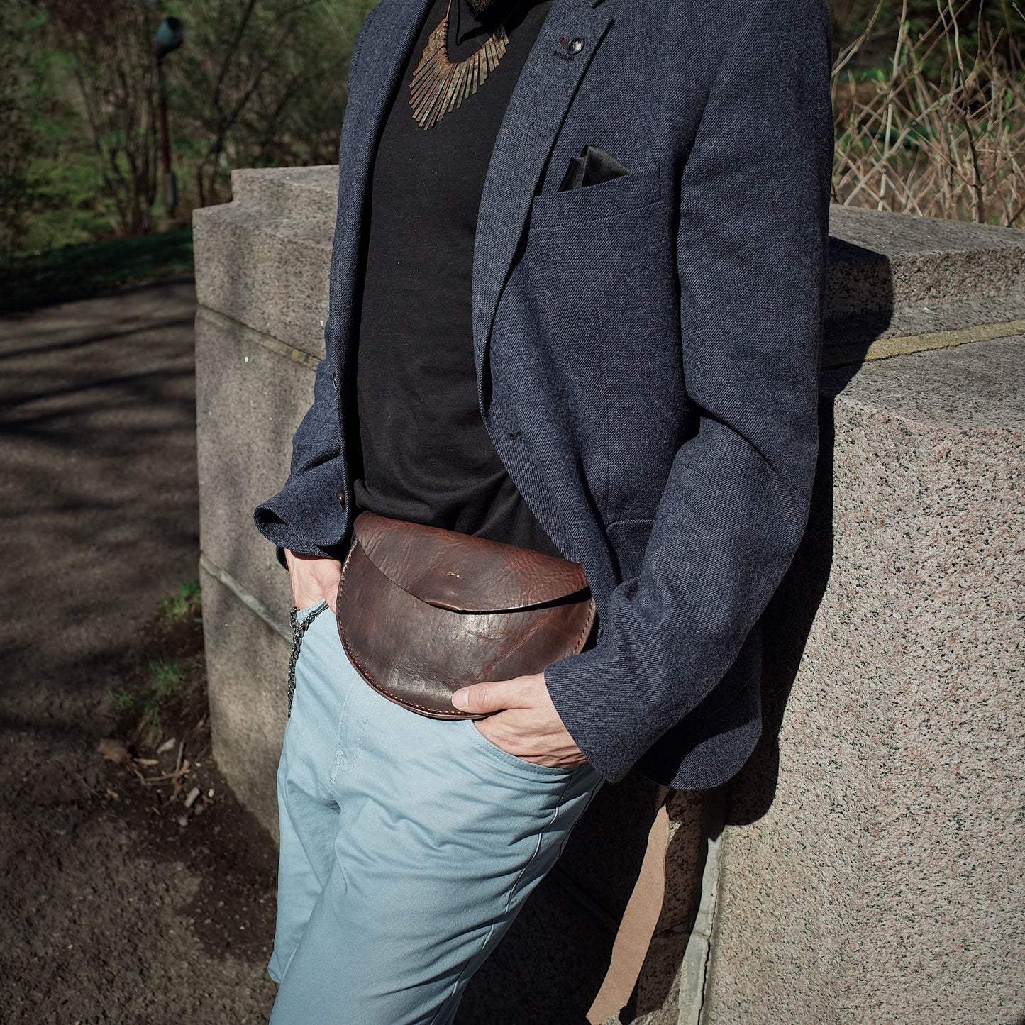 Elegant mocha leather moon bag for fashion-conscious travelers
