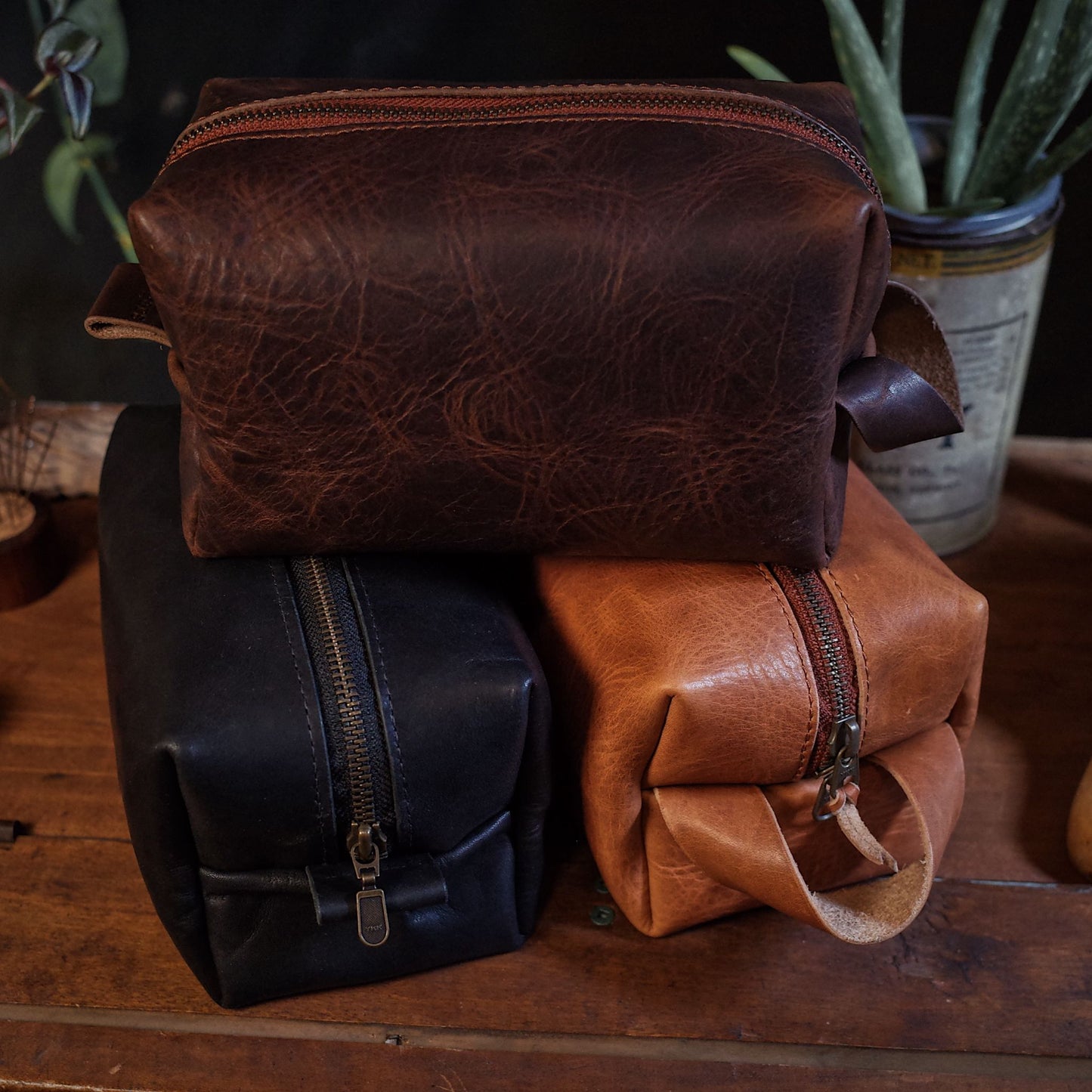 Durable coffee brown leather wash bag with smooth, durable zipper

