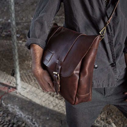 Stylish mocha leather messenger bag with functional design

