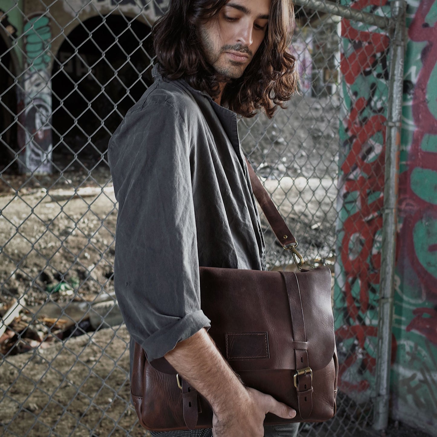 Artisanal dark-brown leather briefcase made from eco-friendly materials
