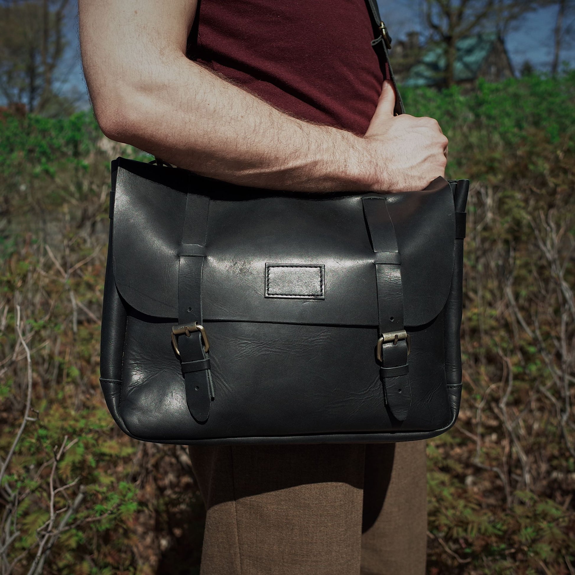 Personalized black leather carryall for business and travel
