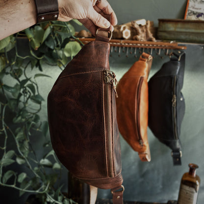 Handcrafted dark-brown leather moon bag for oversized essentials
