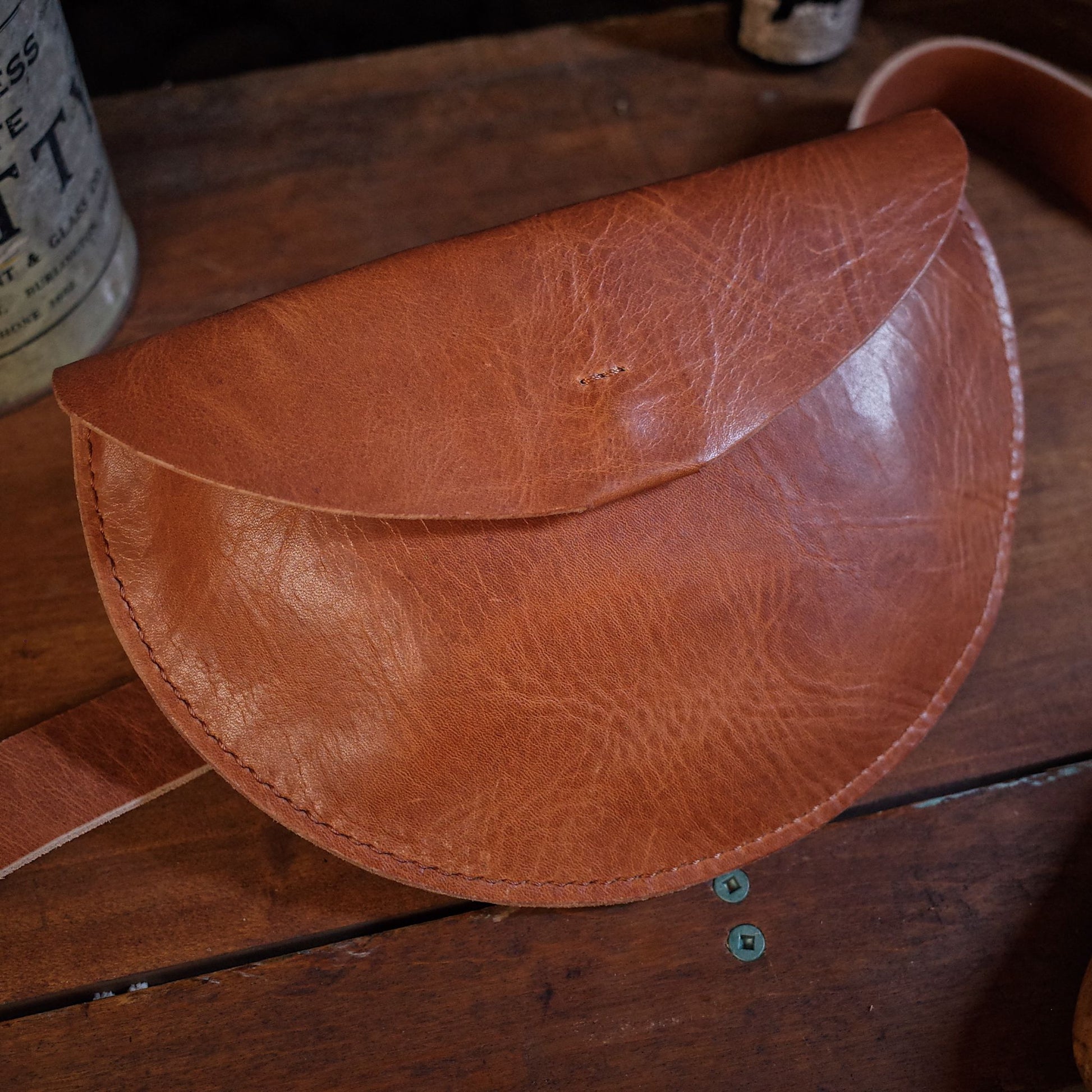 Full-grain saddle tan leather fanny pack perfect for events
